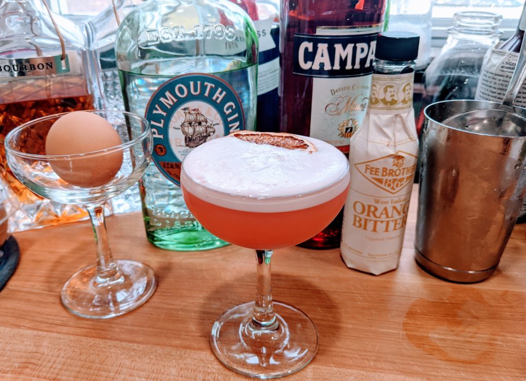 Gin-Campari Sour cocktail served in a glass.