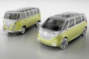 A microbus painted in multiple colorful versions.