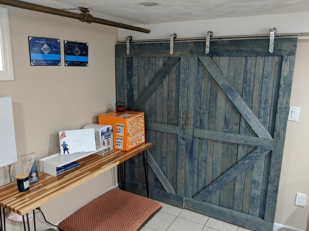 A newly built door closing off the home office storage room.
