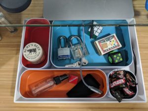 A drawer in the home office desk.